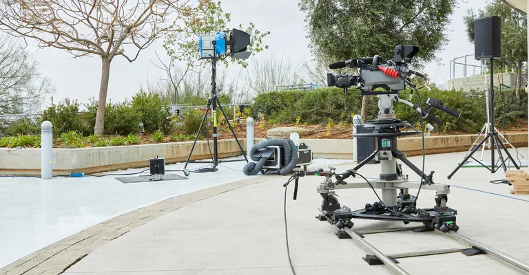 Camera and lighting rig set up for an outdoor shoot
